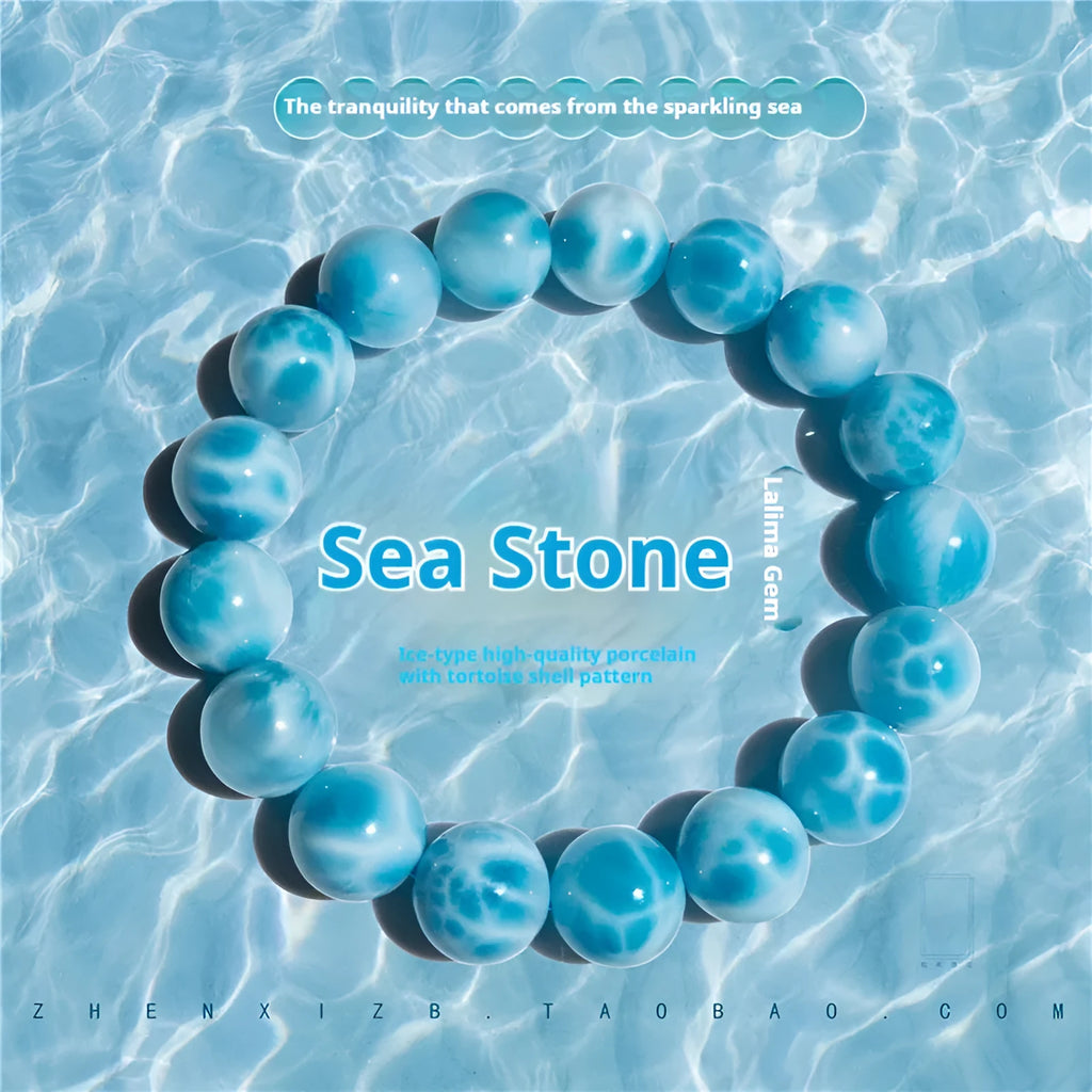 Blue handmade bodhi bracelet with natural crystal sea-pattern stone and pearl beads in Maillard style.