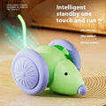 Interactive cat toy electric mouse car in green and white with obstacle avoidance on a living room floor
