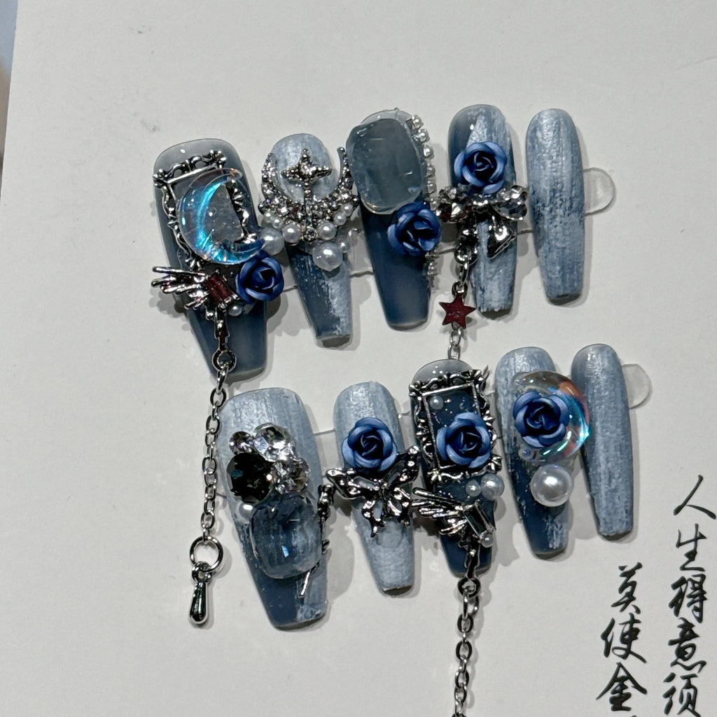 Blue artificial nails with rose flower pattern for evening manicure in four sizes