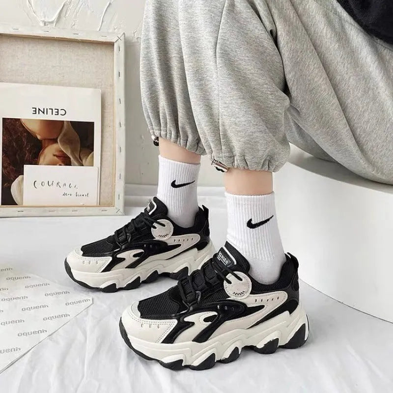 Women's colourblock sneakers with black mesh upper, super high heel, cross shoulder strap, and lace-up closure