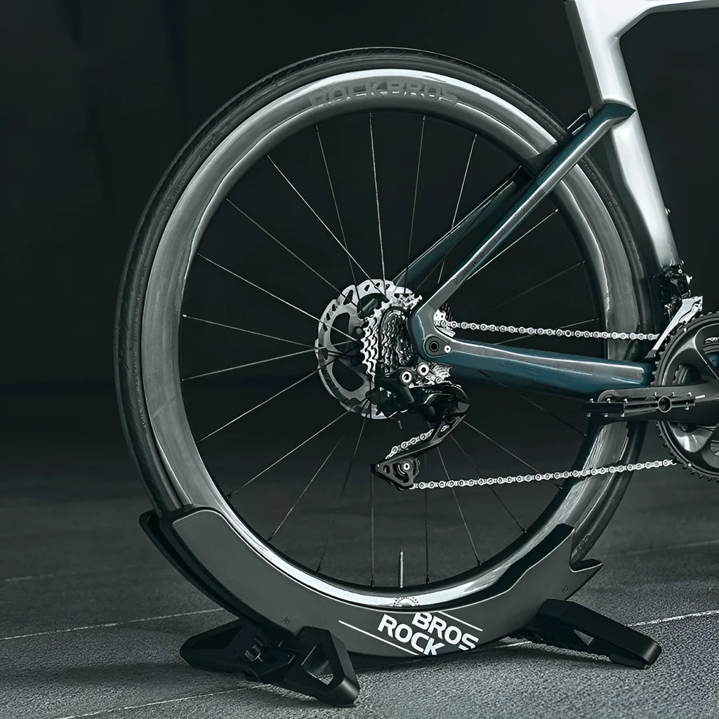 Black and green ABS plastic bicycle wall mount parking rack holder with fixed bracket.