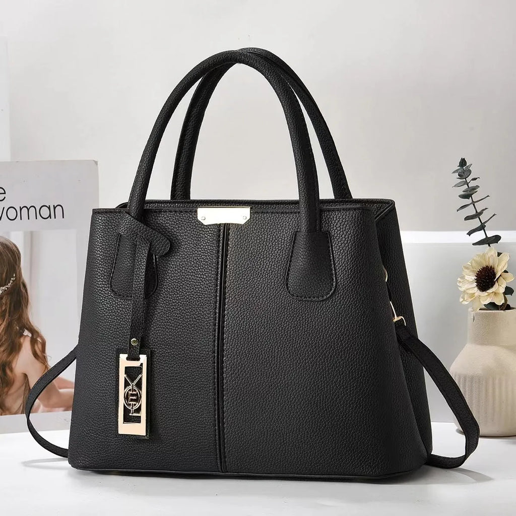 Soft PU fashion handbag with leather shoulder strap in horizontal square shape