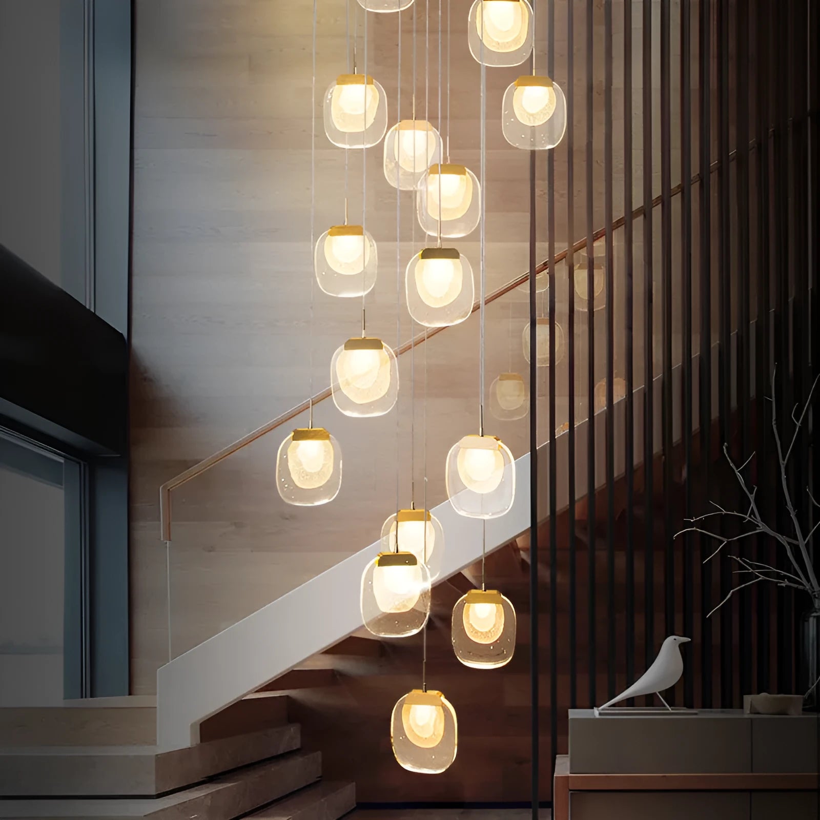 Postmodern crystal chandelier with six gold heads, stainless steel chassis, and adjustable cable on a ceiling