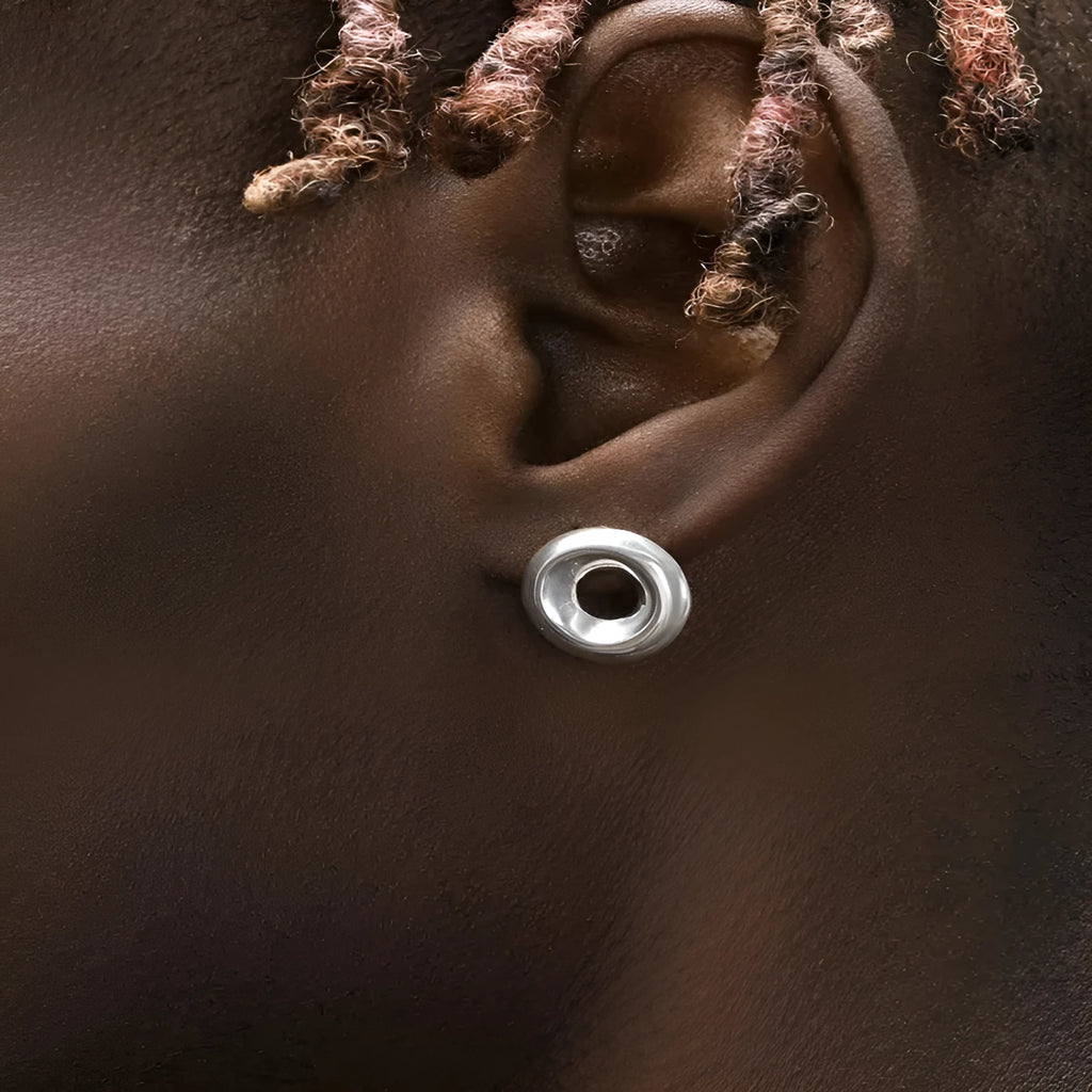 925 sterling silver O-ring earrings with 15mm diameter shiny finish on a neutral background