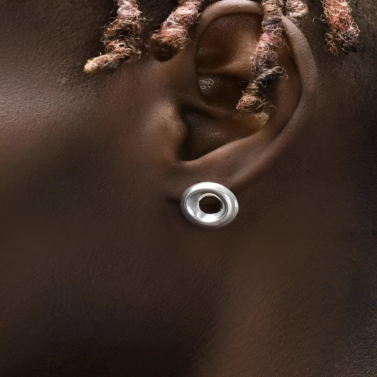 925 sterling silver O-ring earrings with 15mm diameter shiny finish on a neutral background