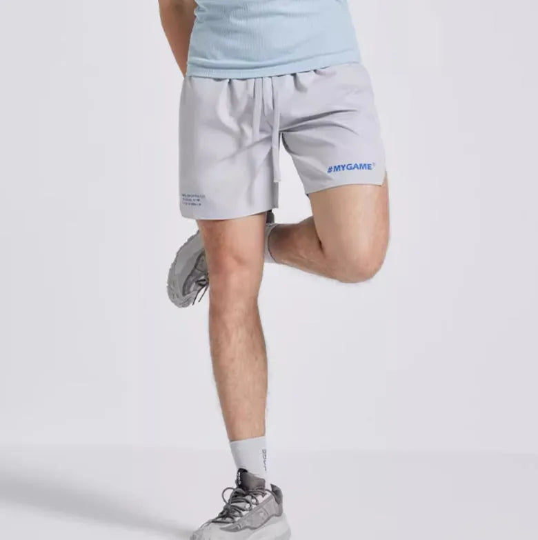 Men's fitness training shorts in blue, black, grey or white with moisture-wicking fabric