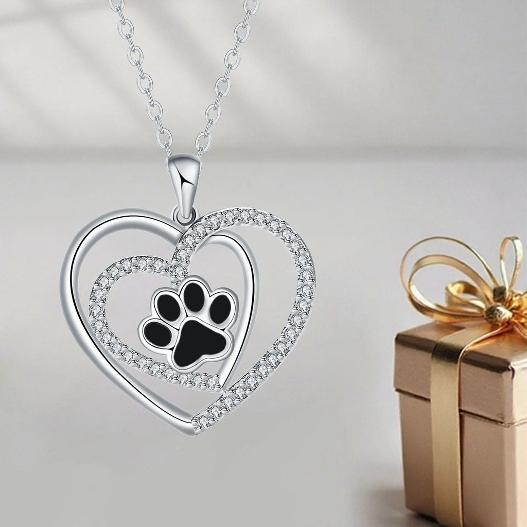 Copper dog paw print necklace with heart motif on cross chain for women