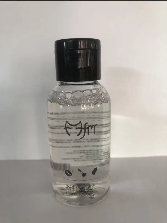 50ml makeup brush cleaning liquid in a clear plastic bottle with blue cap, 9x3x3cm size