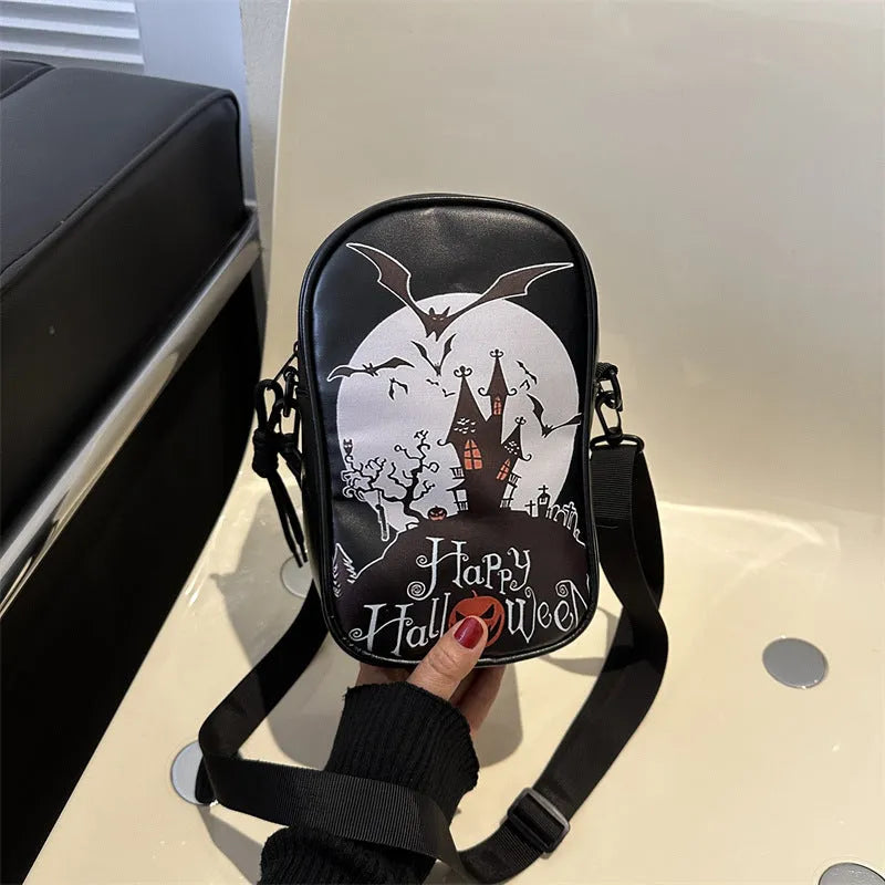Black Halloween graffiti crossbody bag with pumpkin, ghost, and bat print