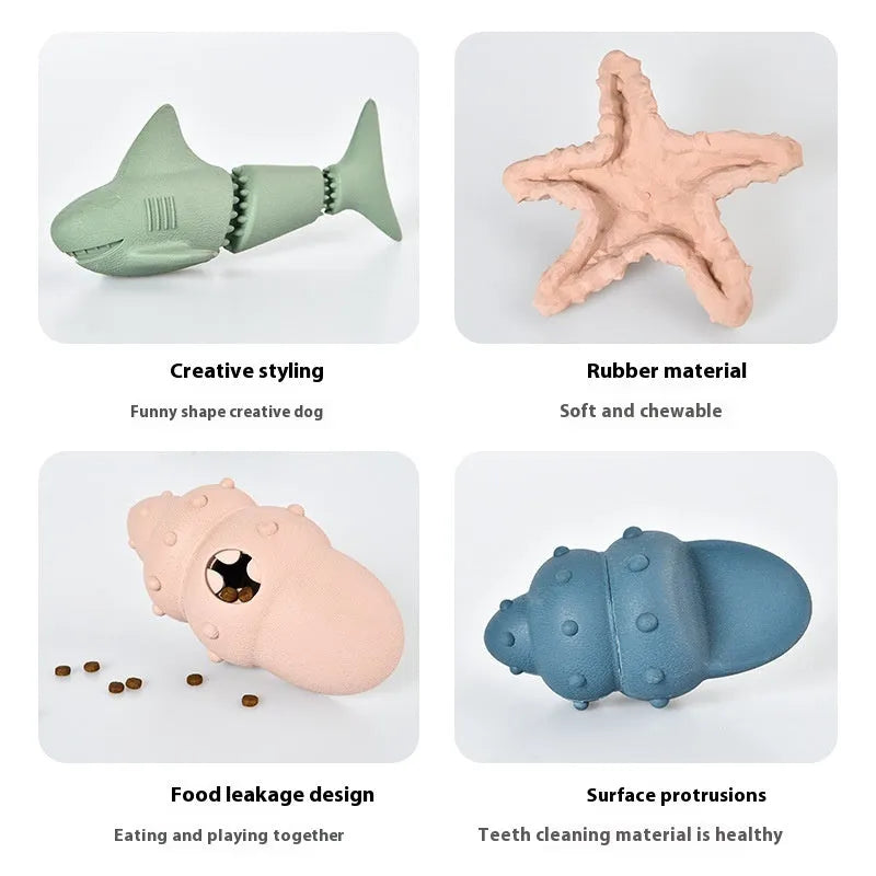 Deep sea shark shaped natural rubber dog chew toy in blue, next to conch and starfish shapes in green.