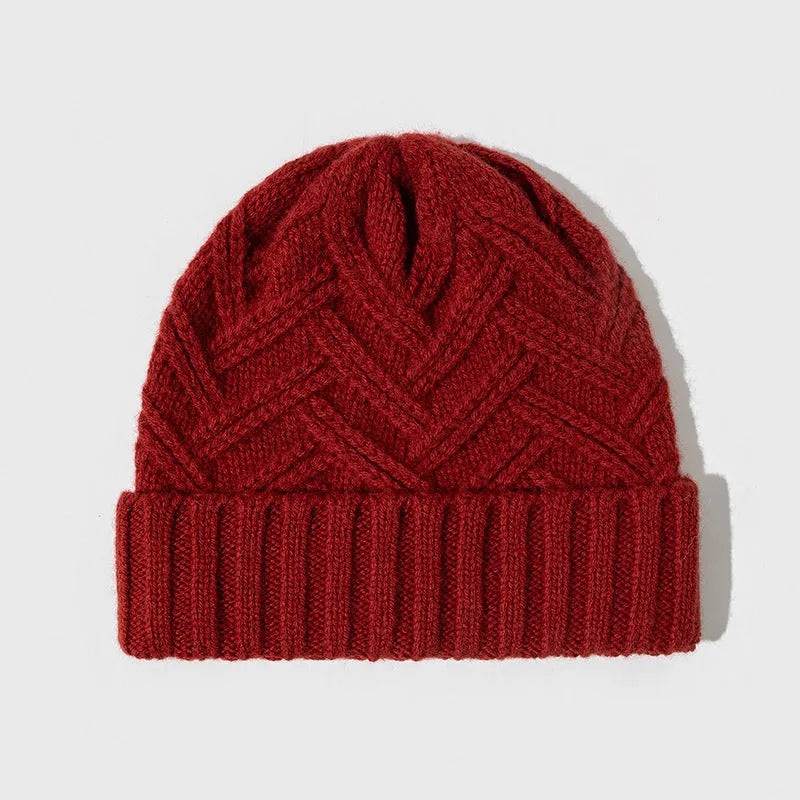 Wool knitted women's hat with dome crown in ankela red colour showing knitted texture