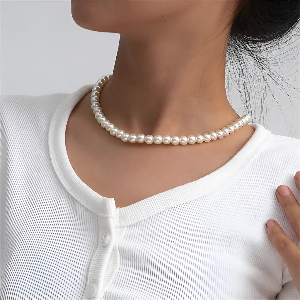 White round alloy pendant necklace for women on a simple background