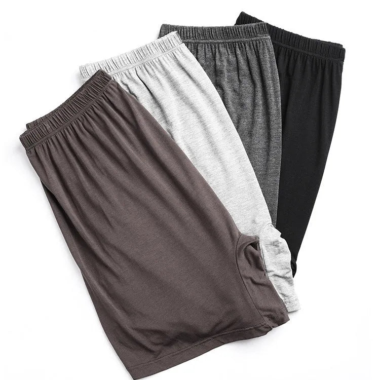 Modal fabric men's high-waisted boxer shorts in solid colours on a white background