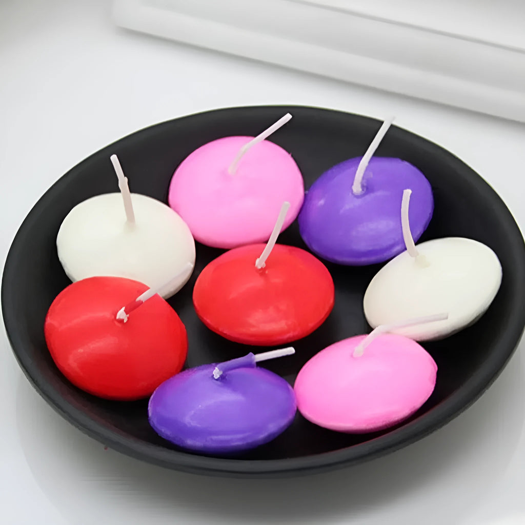 Ivory white cylindrical floating candles made of paraffin wax in a 10 pack for wedding decor