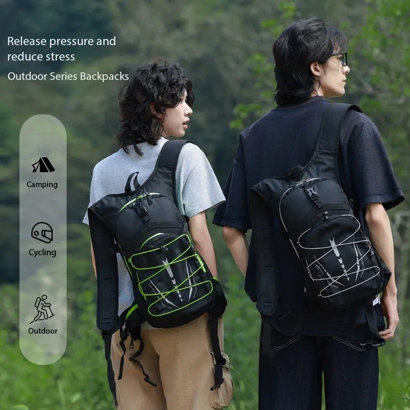 Lightweight breathable mesh hydration backpack in black with reflective details for trail running or mountain biking