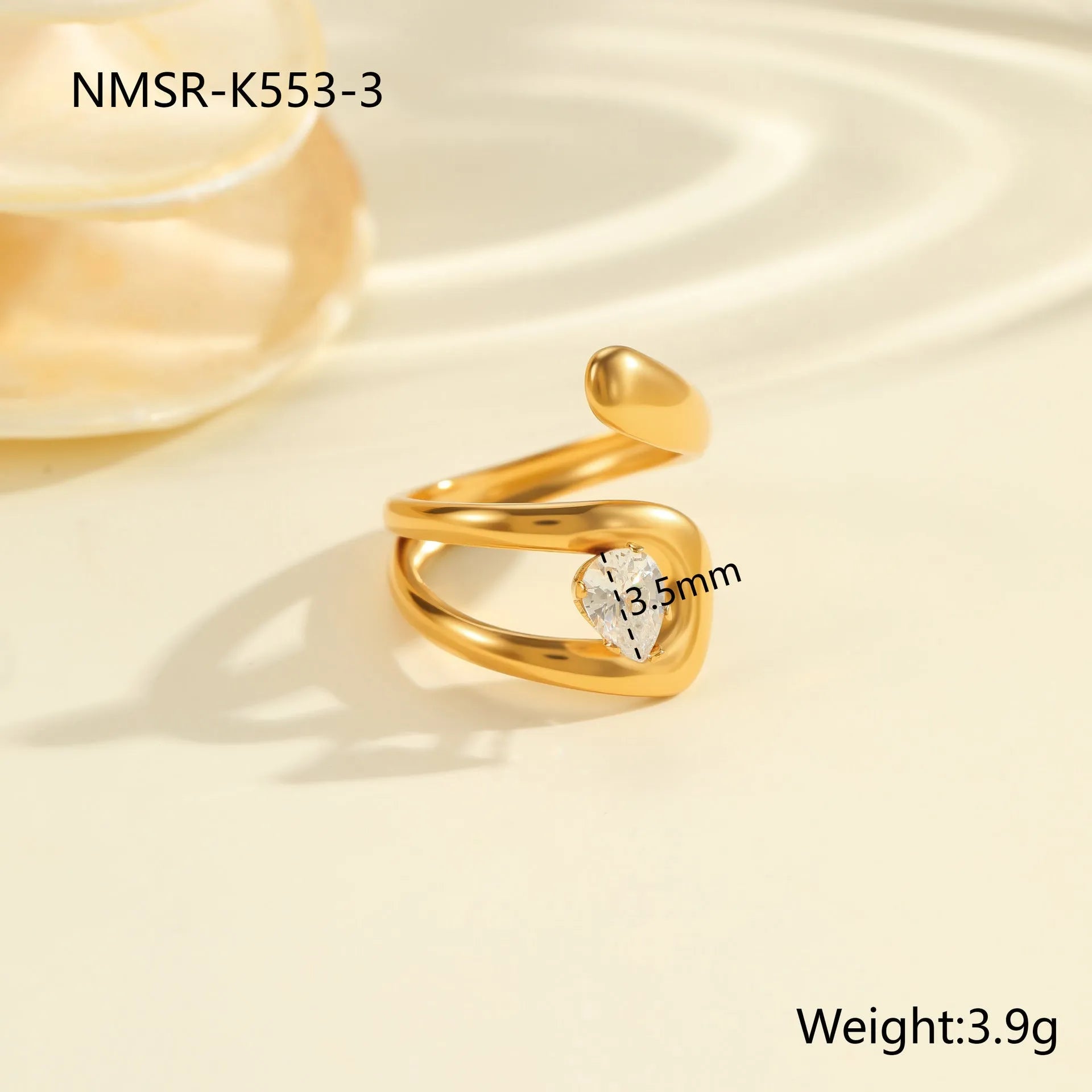 Geometric stainless steel zircon ring with open-mouth adjustable design on a hand.