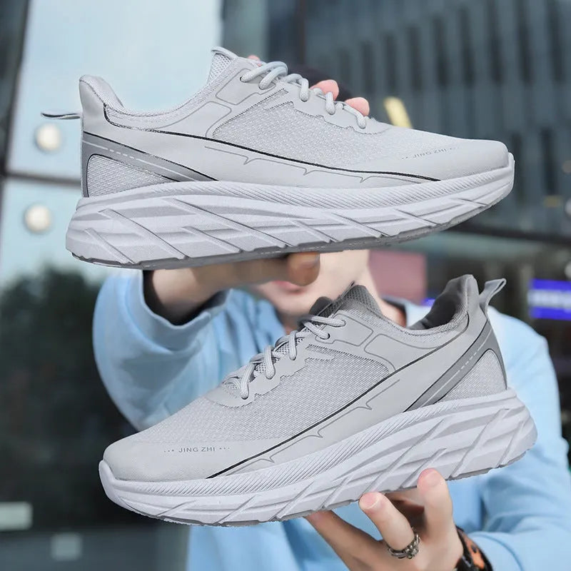 Mens thick-soled anti-skid lace-up running sneakers with rubber sole in black and grey colour options