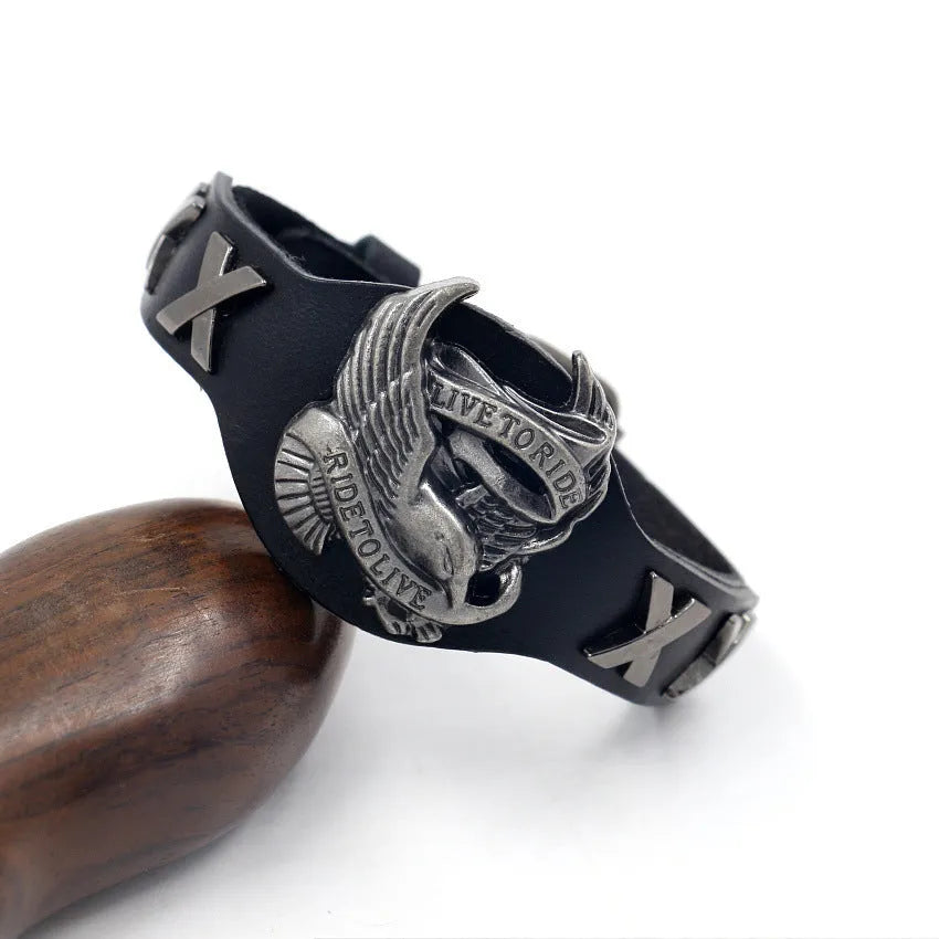 Black geometric leather bracelet with alloy eagle closure, showing adjustable width from 1.7 to 3.8cm