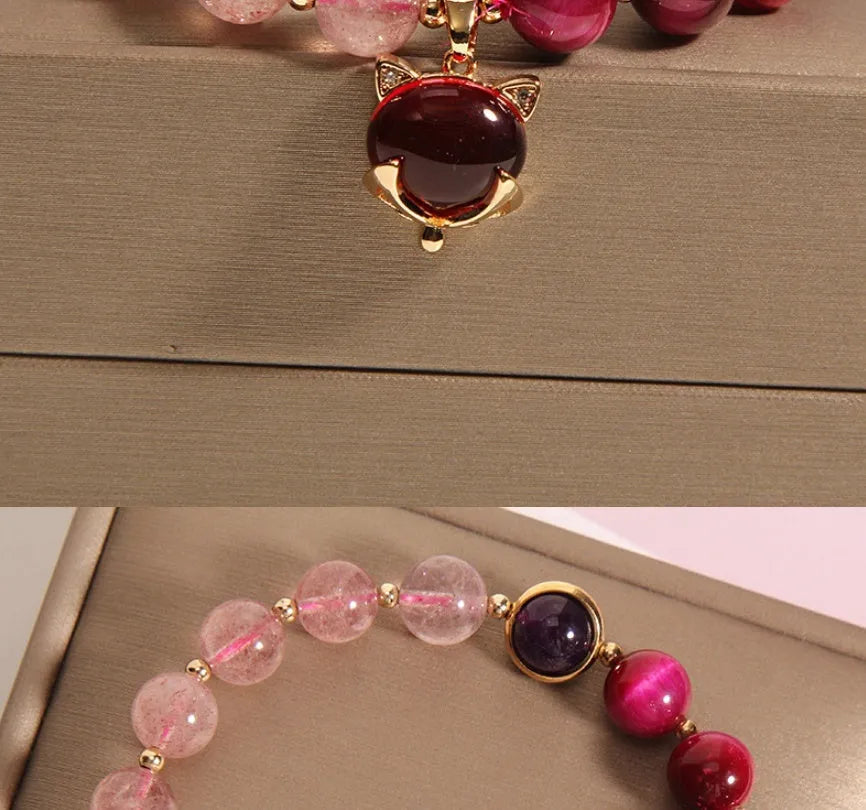 Women's strawberry crystal bracelet on elastic rope measuring 18cm with simple jewellery design