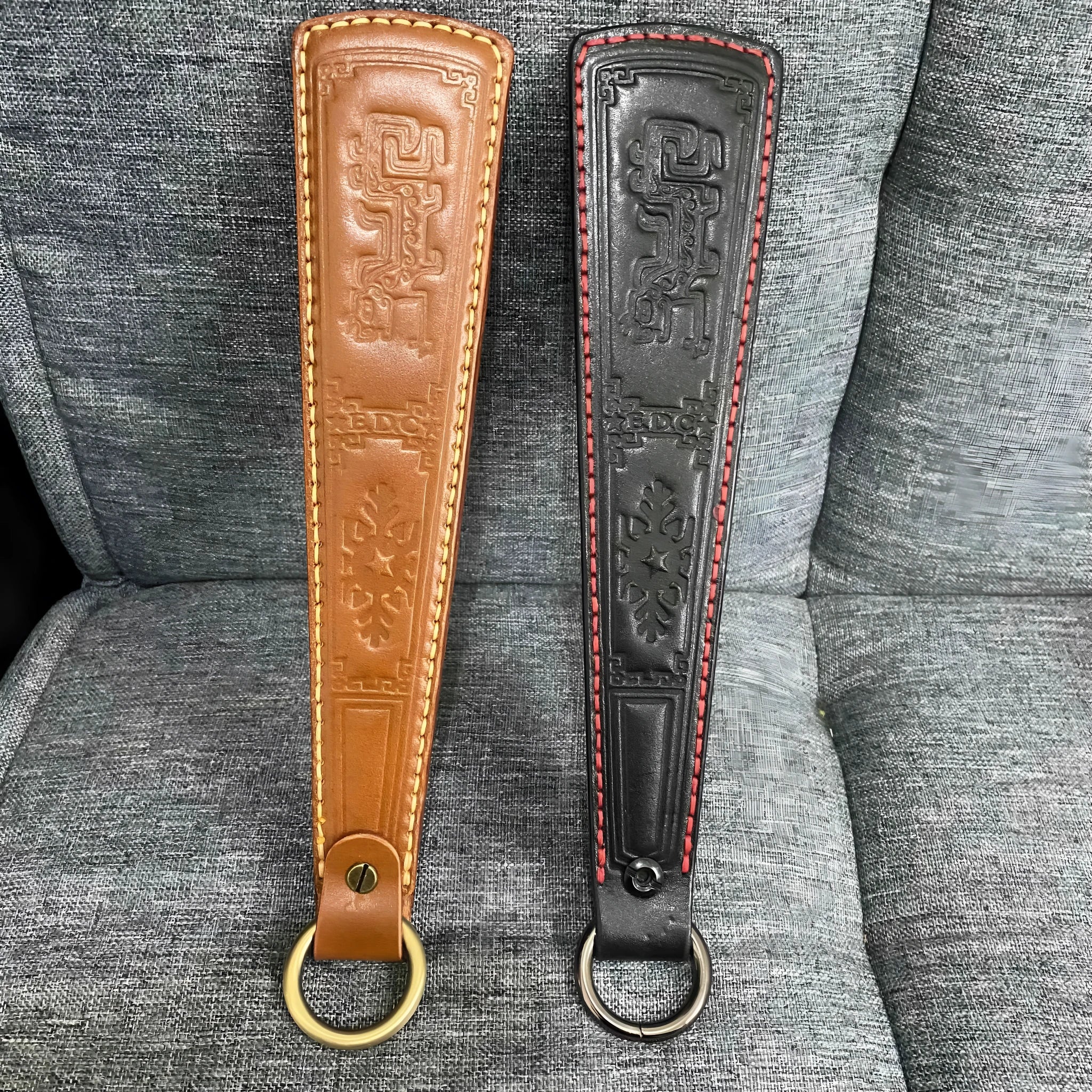 Pat massage anti-body skin racket with thick vegetable tanned leather and stainless steel panel, 25.5cm length, black colour