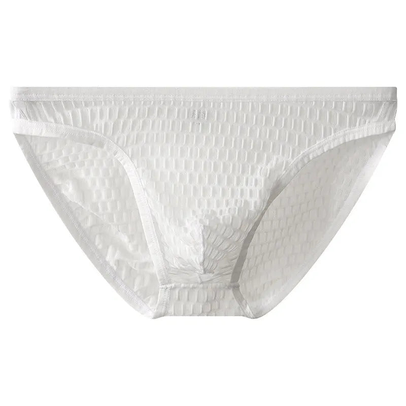 Men's low waist transparent lace underwear shorts in a solid colour on a neutral background.