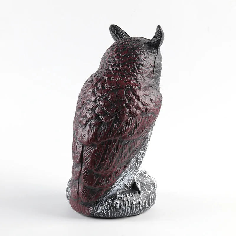 Three-piece set of red artificial PE plastic owl garden ornaments on a white background