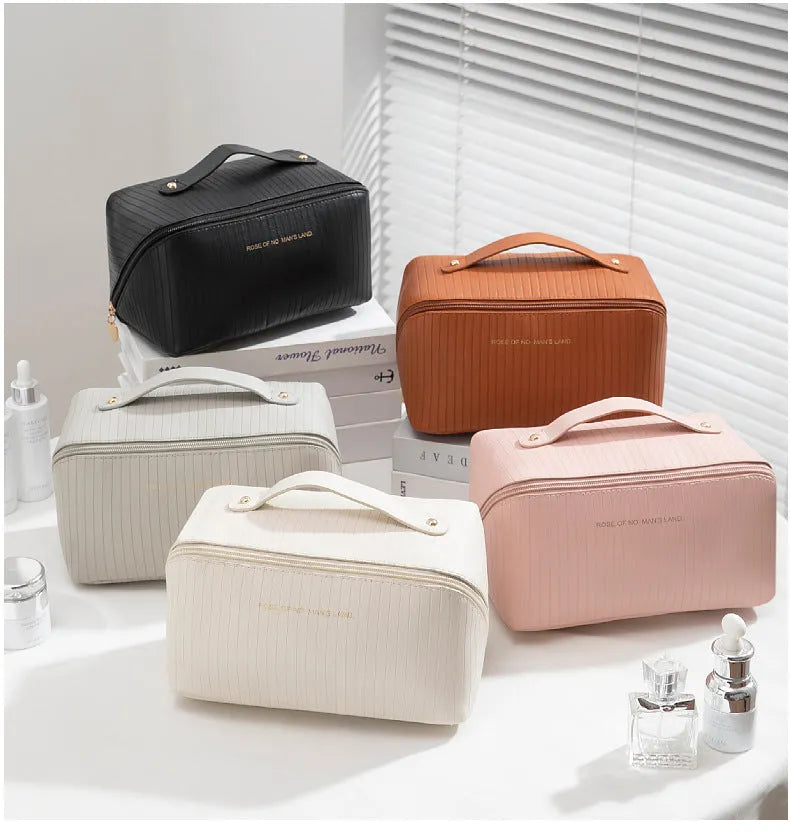 Beige cubic PU vertical pattern pillow makeup bag for travel, showing dimensions of 22.5cm by 12.5cm.