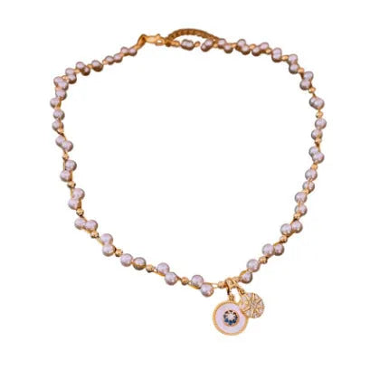 Gold electroplated pearl pendant necklace with adjustable 41-50cm clavicle chain and zircon inlaid details