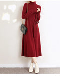 Turtleneck knitted dress with elastic waist and loose big hem in rose red colour