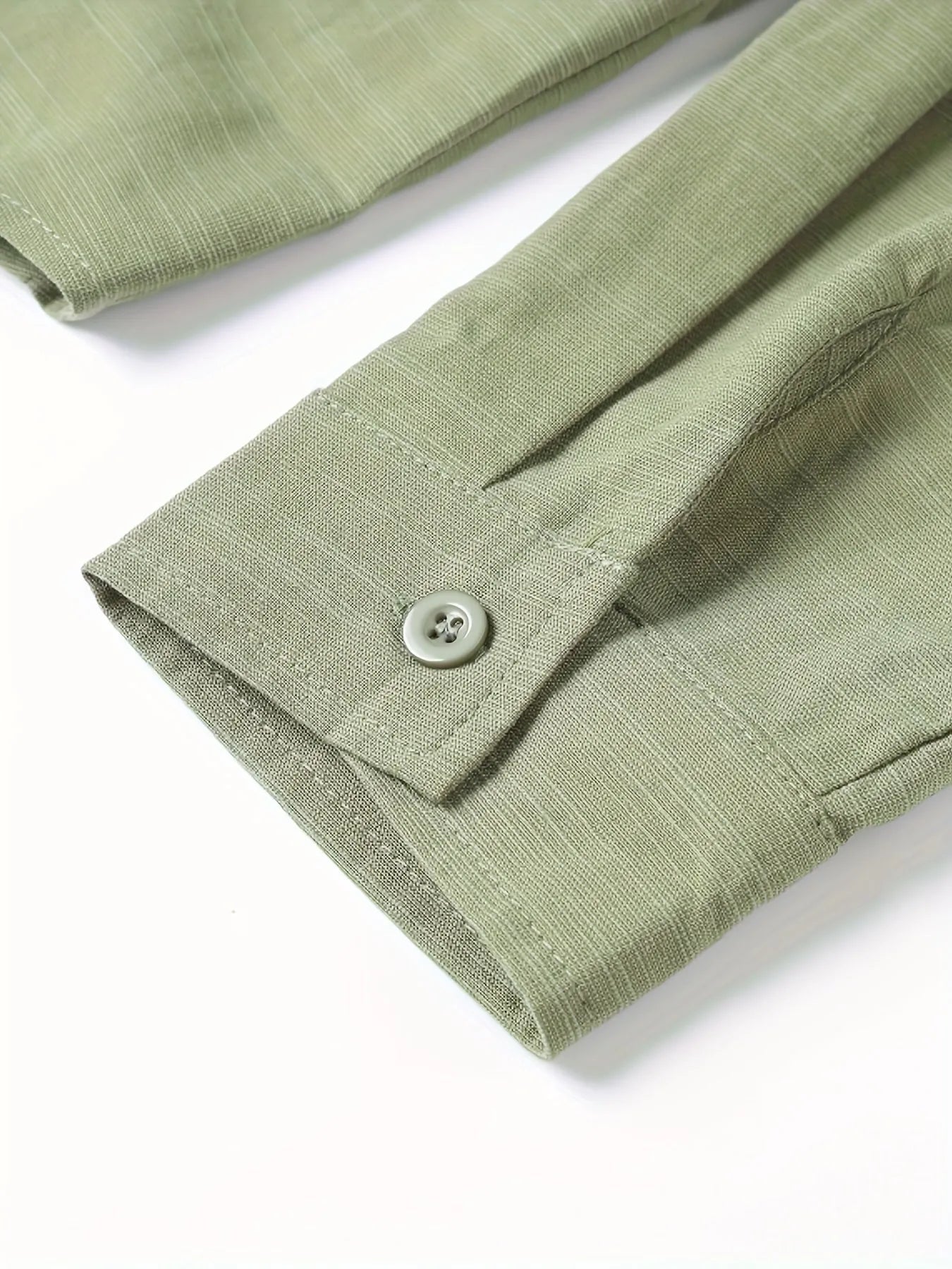 Light green linen men's casual shirt with lapel collar and long sleeves, front view