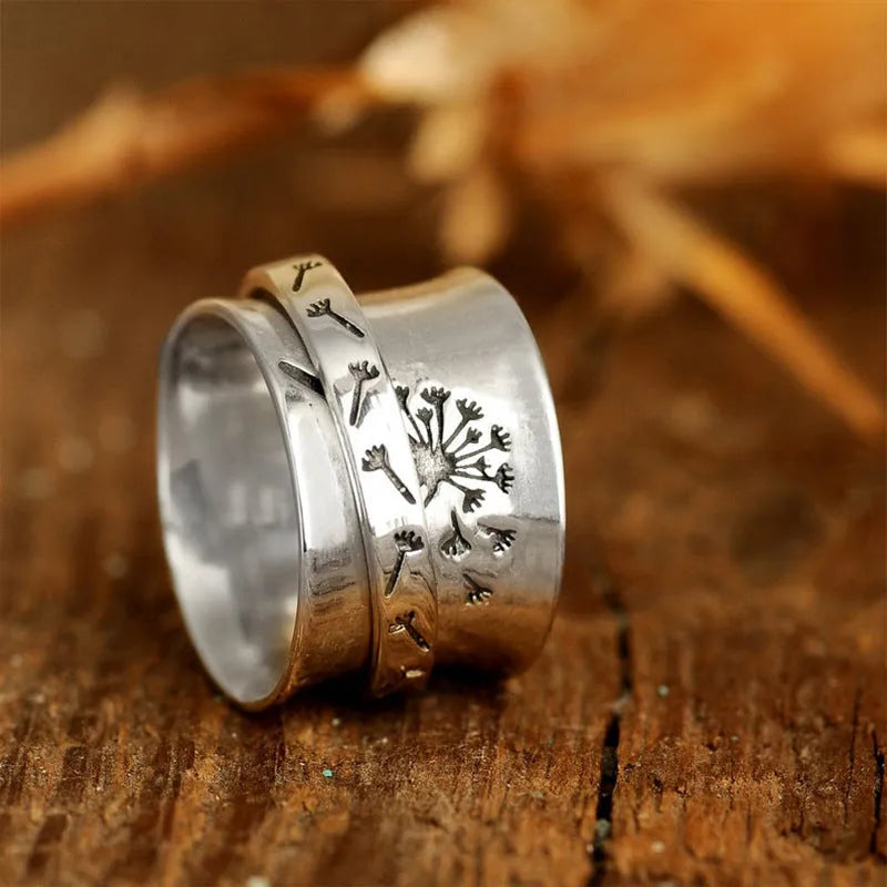 Silver electroplated rotatable flower ring showing adjustable design and flower shape