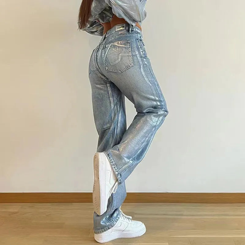 Washed blue high-waist straight-leg jeans on a hanger, showing the front view.