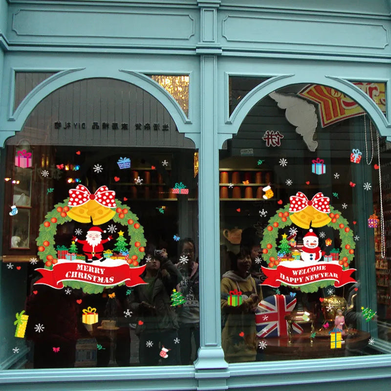 Two large colourful cartoon electrostatic window stickers, each measuring 60cm by 45cm, on a glass surface.