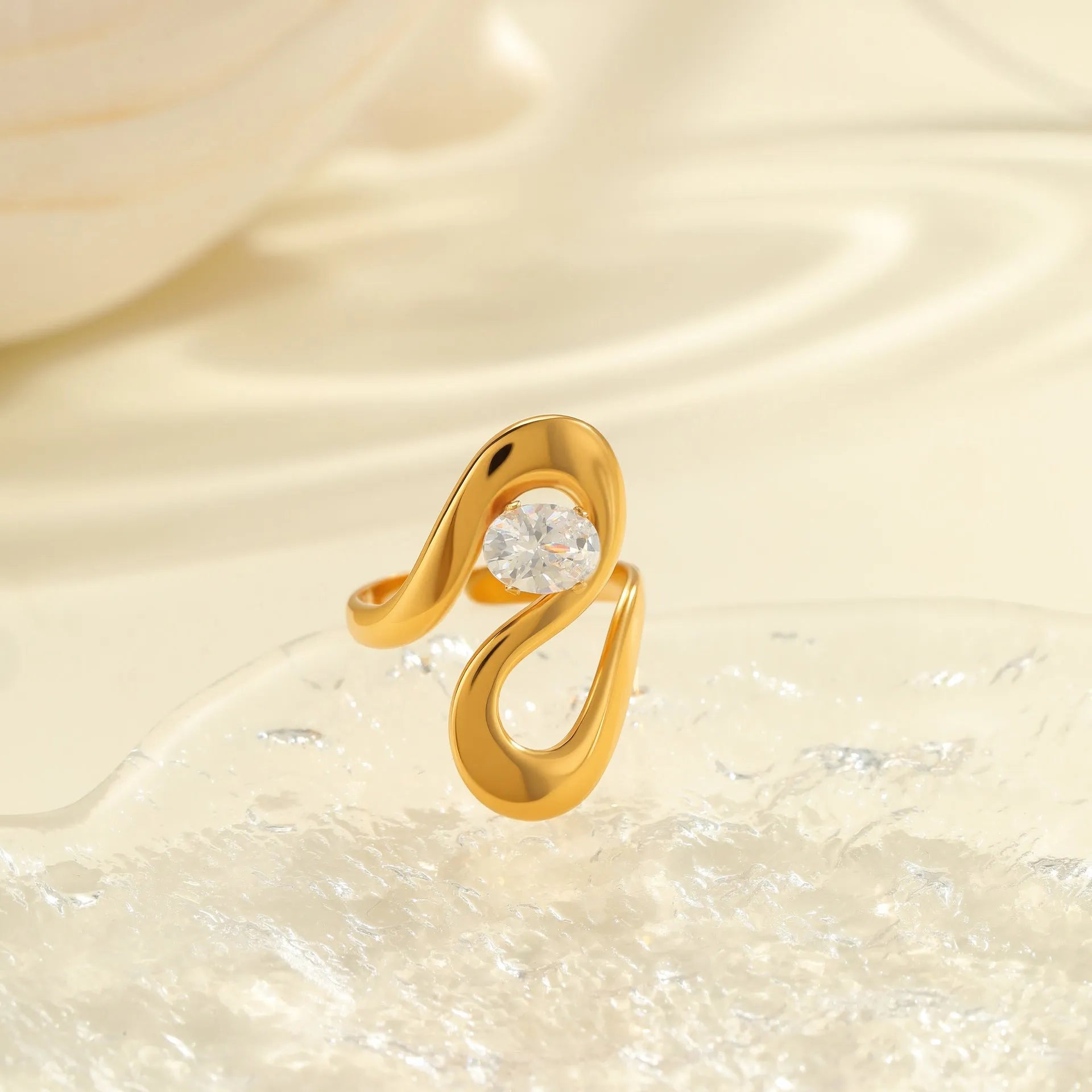 Geometric stainless steel zircon ring with open-mouth adjustable design on a hand.