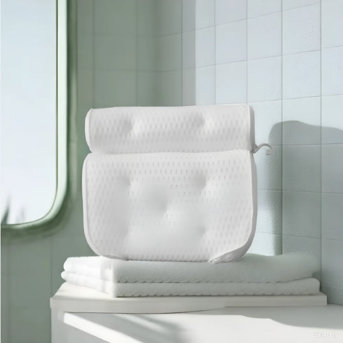White luxury bathtub pillow with textured 3D material and seven large suction cups on the back.