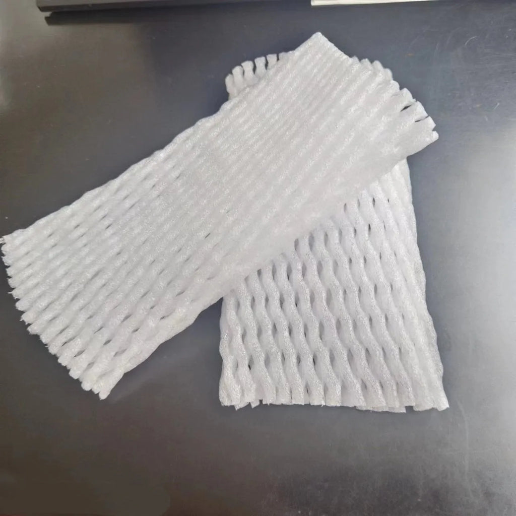 White foam net shockproof protective cover for fruit such as apples and peaches.