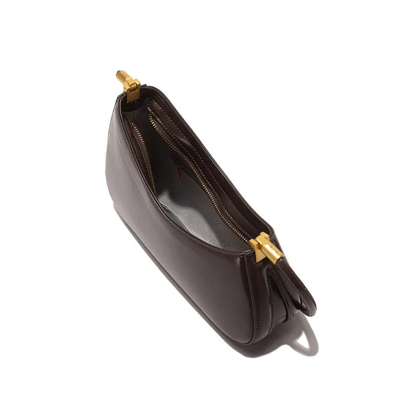 Women's retro oval underarm bag in PU leather with single shoulder strap and sandwich pockets