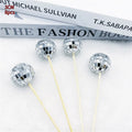 Glass disco ball cake decoration with wooden stick in multiple sizes for celebration cakes