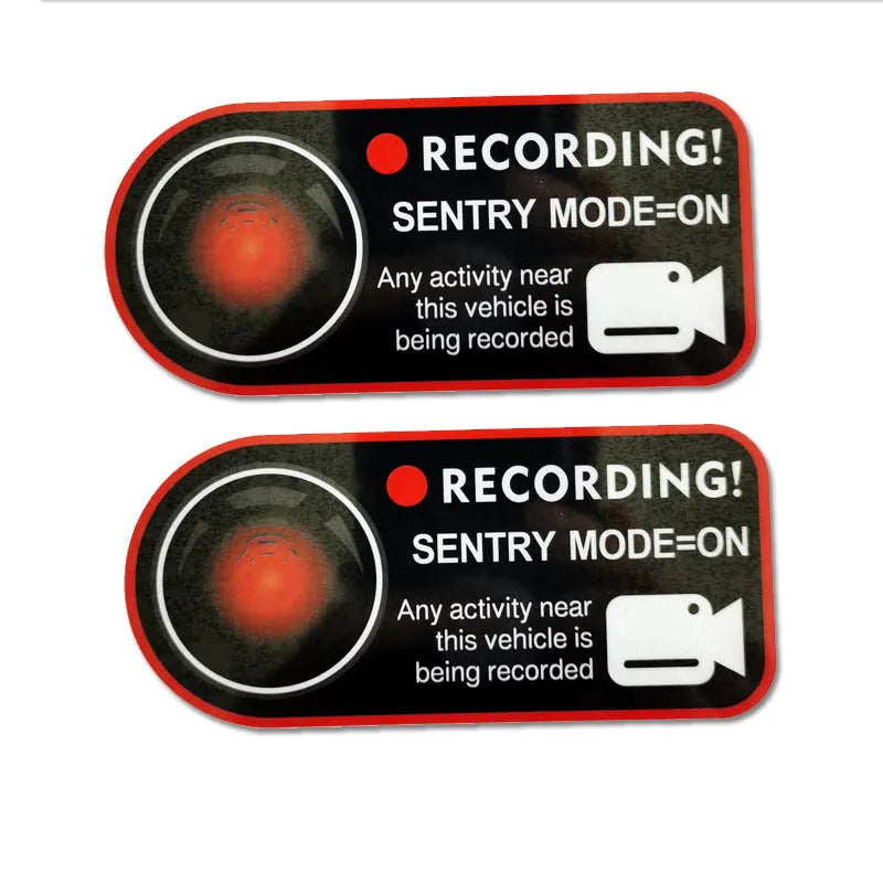 Tesla Sentry Mode warning sticker measuring 11x5 cm with electrostatic backing for window application