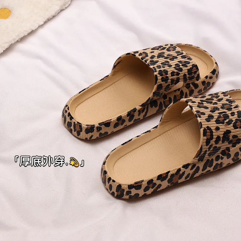 Women's leopard print EVA slippers with thick sole on a white background.