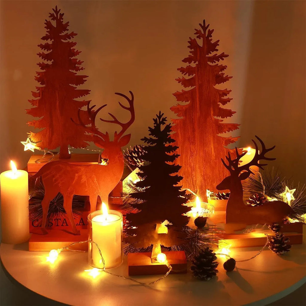 Set of three rustic iron Christmas tree and elk ornaments for holiday decor.