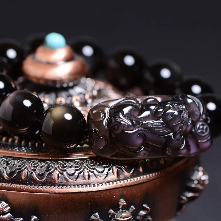 Polished crystal Pi Xiu bracelet in ethnic geometric style on wrist