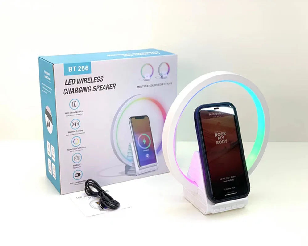 White square Bluetooth speaker with wireless charging pad and ambient LED light on top