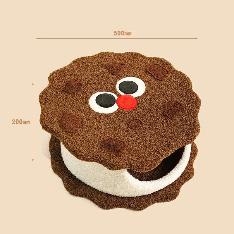 Khaki sandwich cookie shaped cat bed made from faux fur, closed design for cold weather sleeping