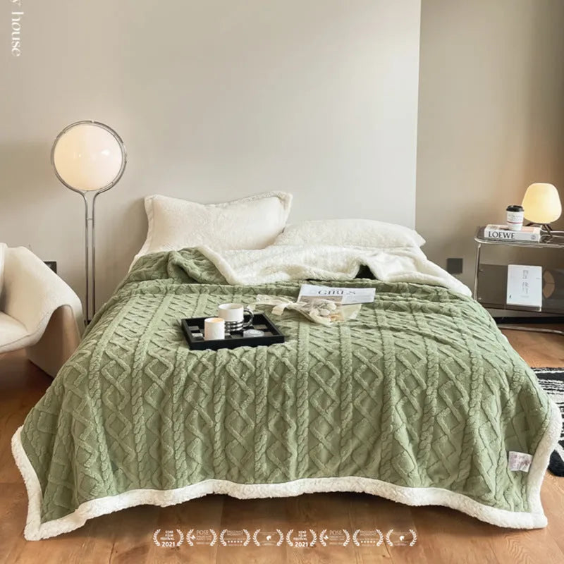 Polyester thermal flannel blanket in tea green colour on bed