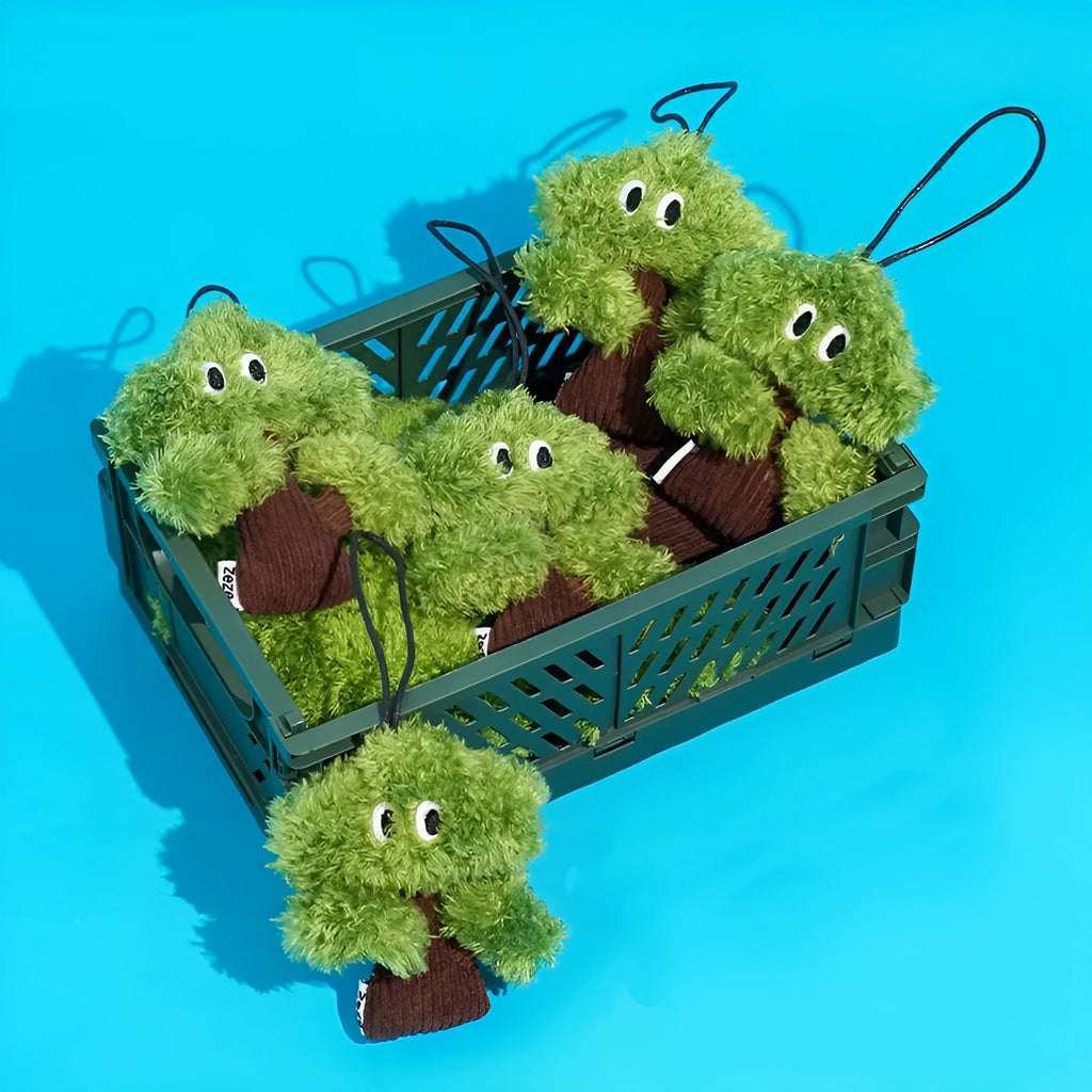 Green pine tree shaped cat toy with hanging loop for biting and interactive play