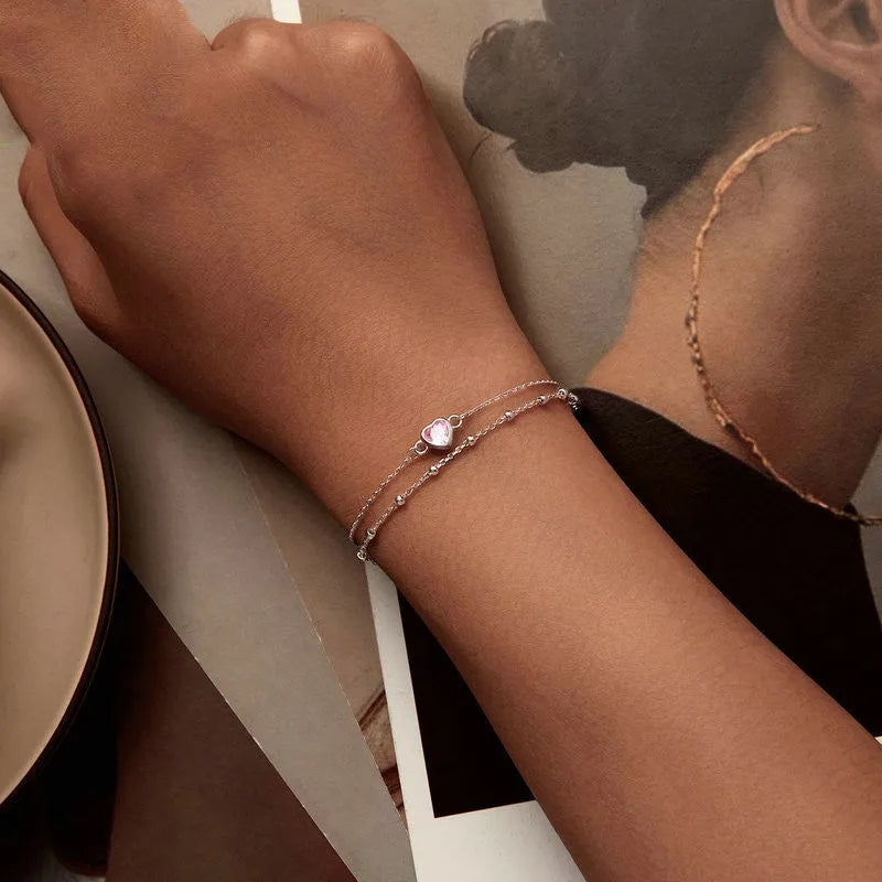 Women's sweet style 925 sterling silver bracelet with a 6mm heart pendant on an adjustable chain.