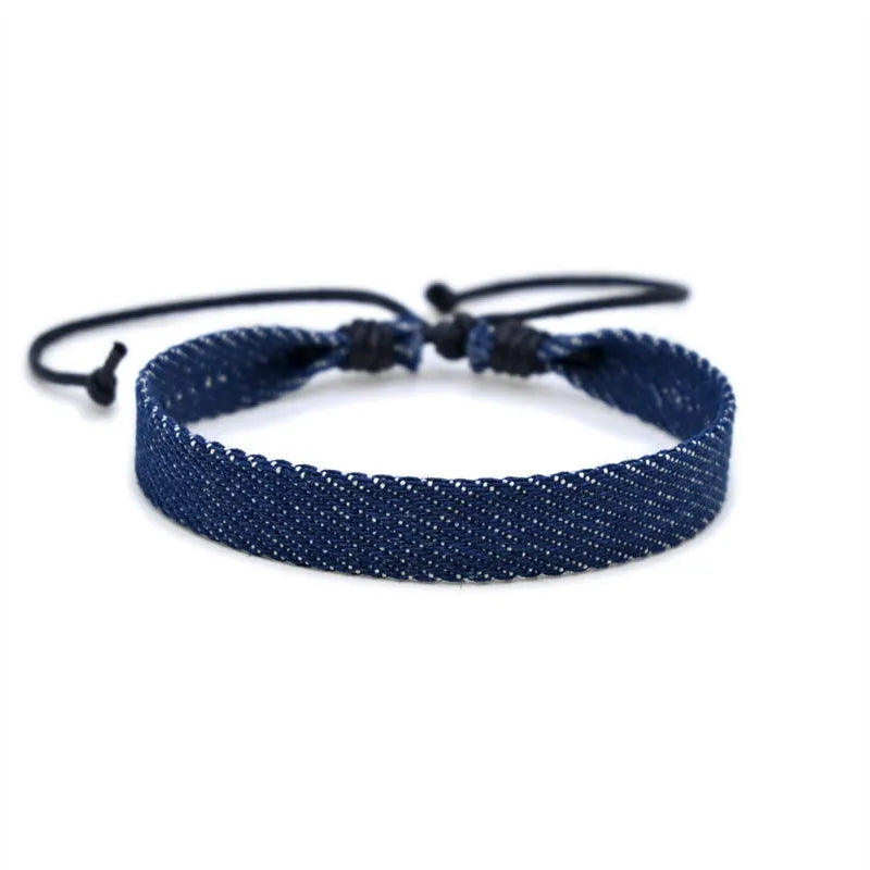 Denim fabric bracelet carrying strap with mixed materials, unisex design for travel