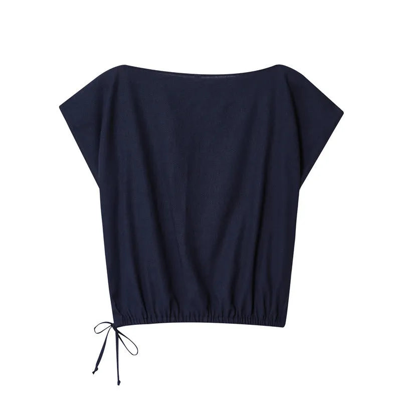 Women's linen blend long sleeve shirt with flounce detail and matching wide leg trousers set on a hanger.