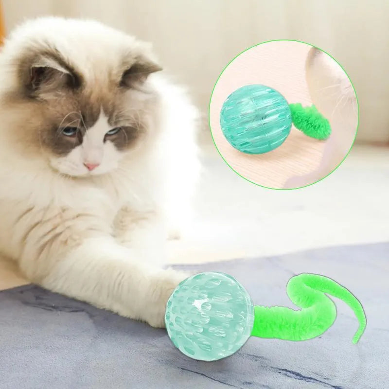 Interactive cat toy with three bouncy TPR balls connected to long plush tail in green colour